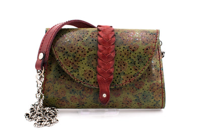 Clutch in red and green patterned with woven trim