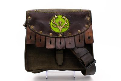 French radio operator's bag in green/brown with fur, rifle strap and golden stag appliqué
