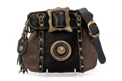 Kilt bag in brown with fur, buckle and coin element