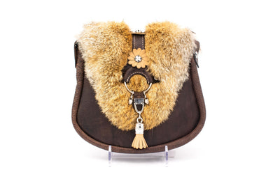 Kilt handbag in brown with fox fur, ring closure and floral element