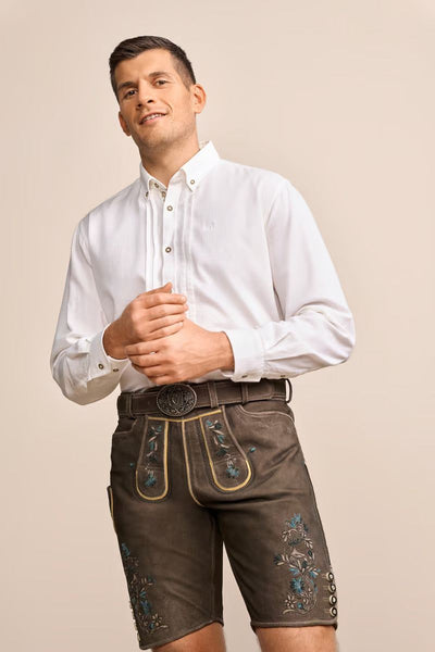 Krueger Traditional Shirt "Bent" in white with delicate cuff embroidery and Kent collar, worn with dark embroidered shorts.