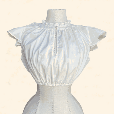 Ecru dirndl blouse from Kruger Collection, size 36, 100% polyester.