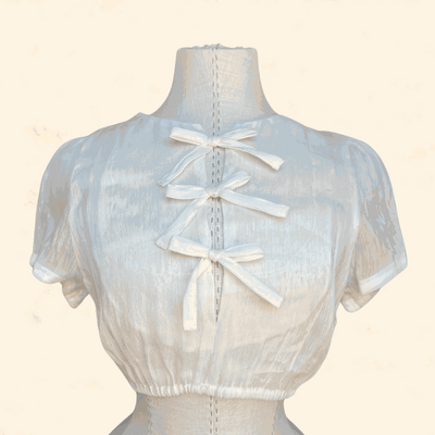 Ecru dirndl blouse from Kruger Collection, size 36, polyester material.