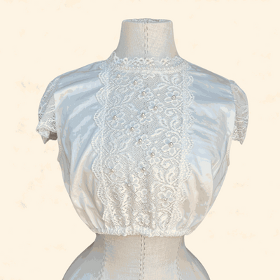 Ecru dirndl blouse by Kruger Collection, 100% polyester, size 36.