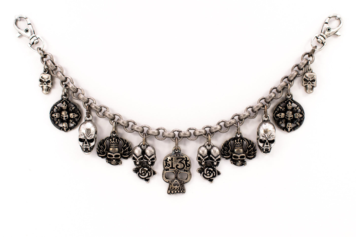 Charivari with various "skulls" in antique silver