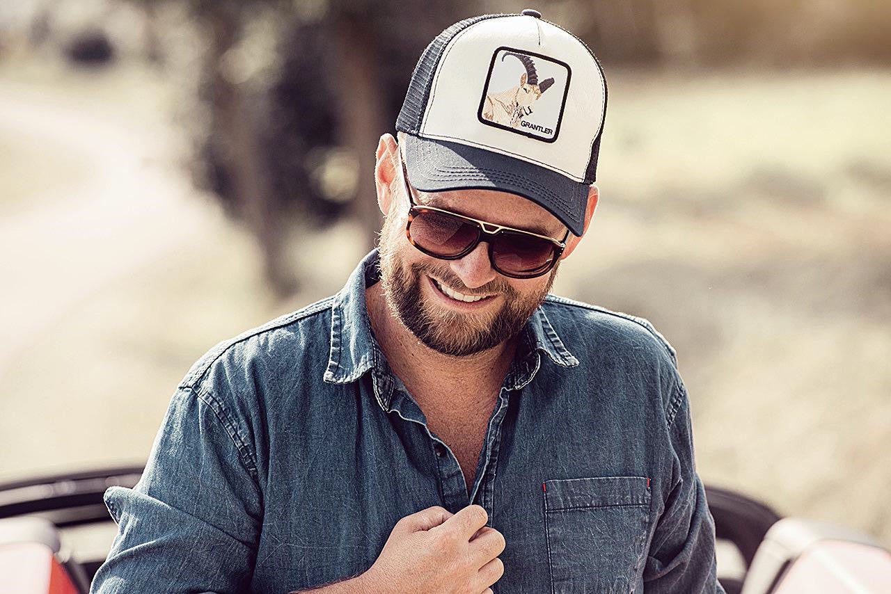 Trucker Cap with Motto Patch and Capricorn