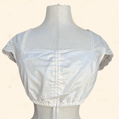 Ecru dirndl blouse from Kruger Collection, size 34, 100% polyester.