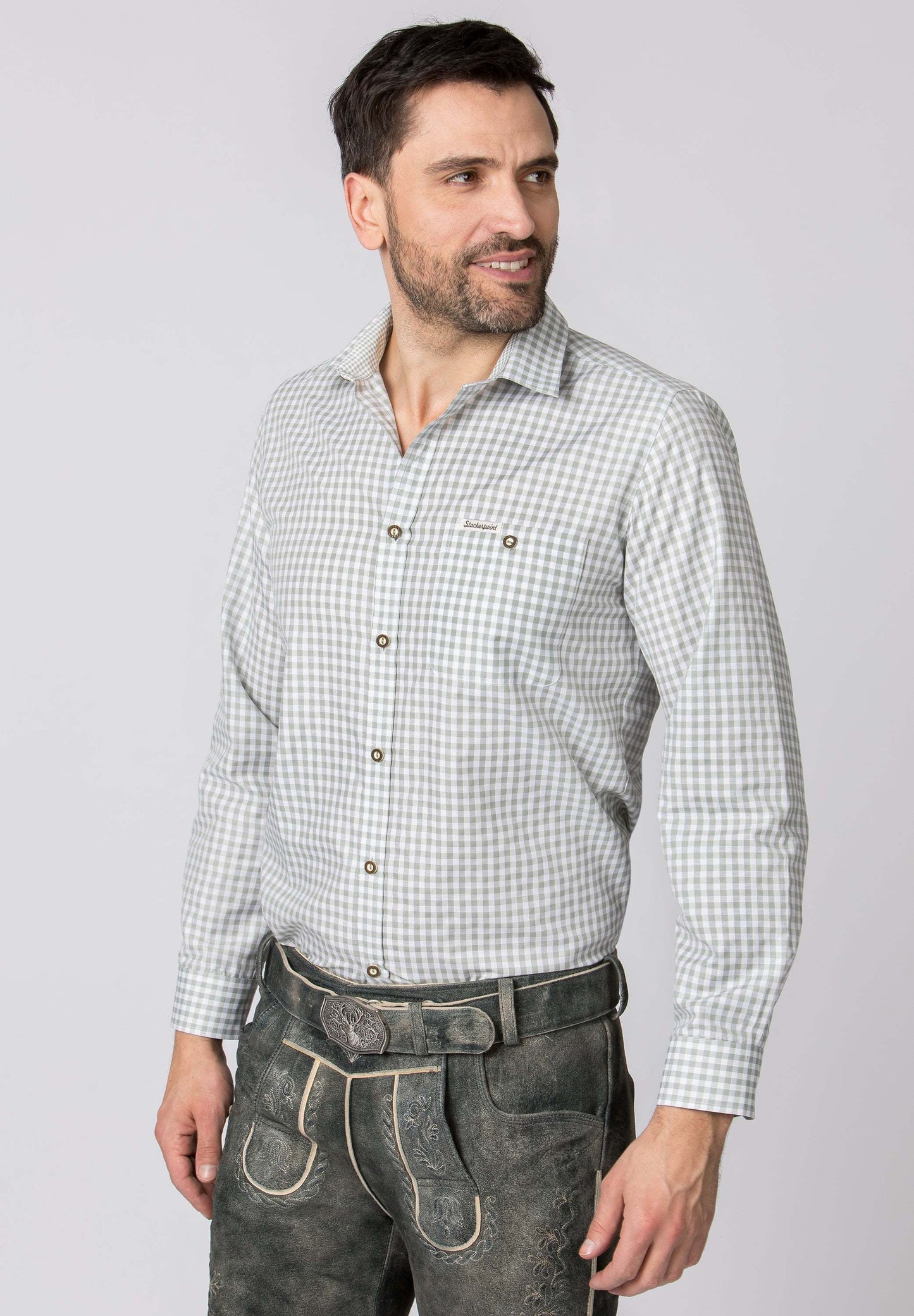 Man wearing Stockerpoint Traditional Campos3 "Sage" long sleeve shirt with retro design and horn buttons.