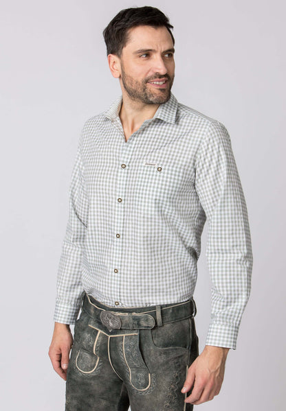 Man wearing Stockerpoint Traditional Campos3 "Sage" long sleeve shirt with retro design and horn buttons.
